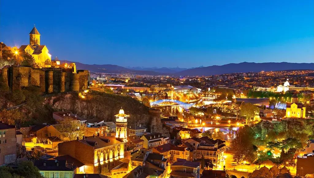 Tbilisi city lights at sunset